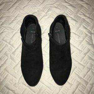 Black booties with zippers